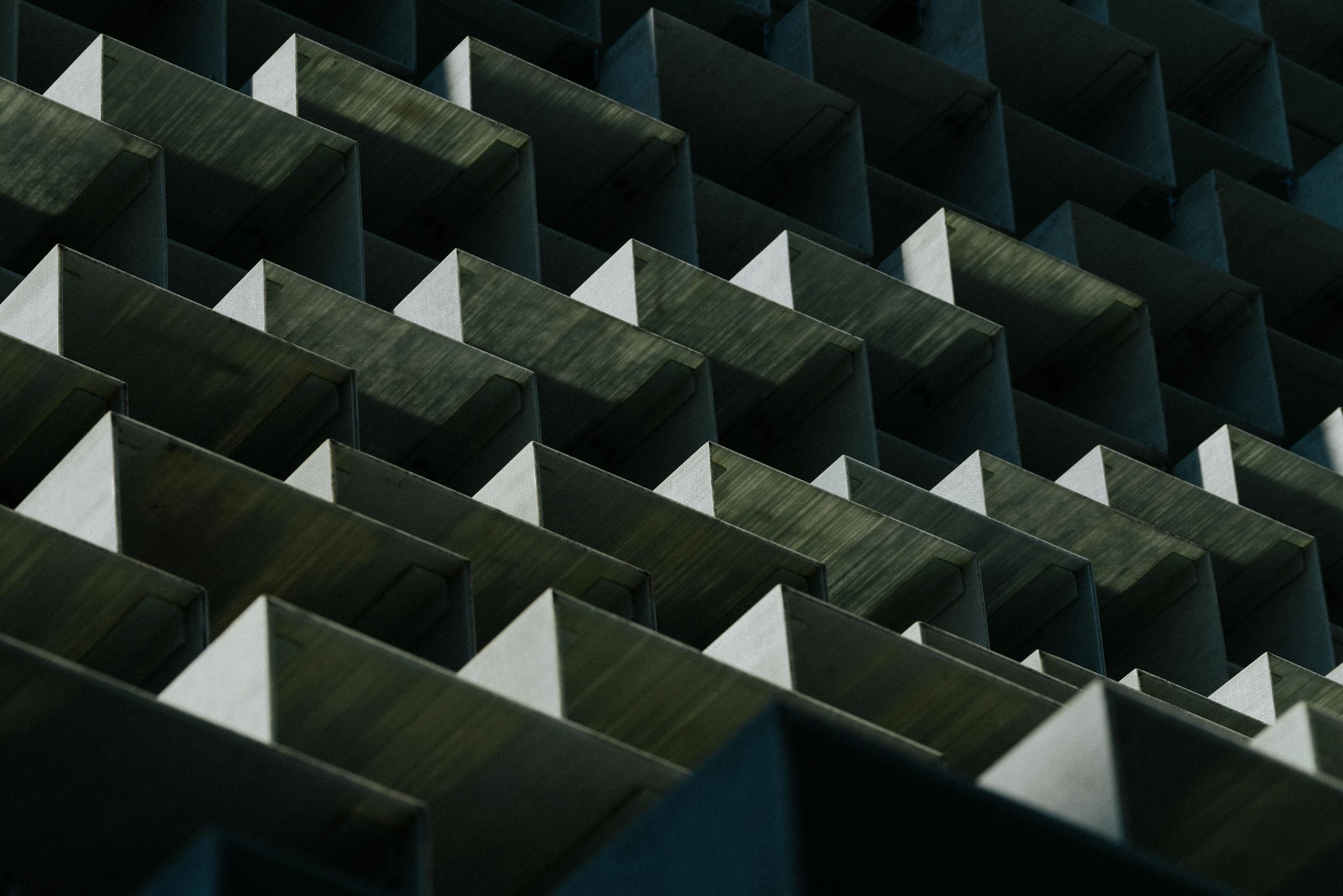 Dynamic geometric pattern of an architectural facade in Toronto, showcasing modern design.